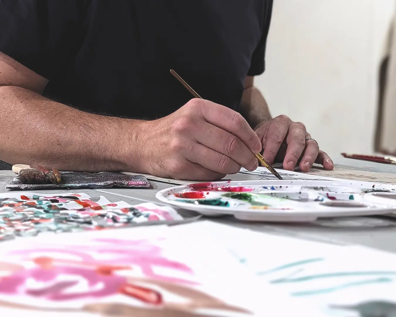 Photo of artist painting